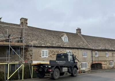Woodford Mill with new collyweston roof