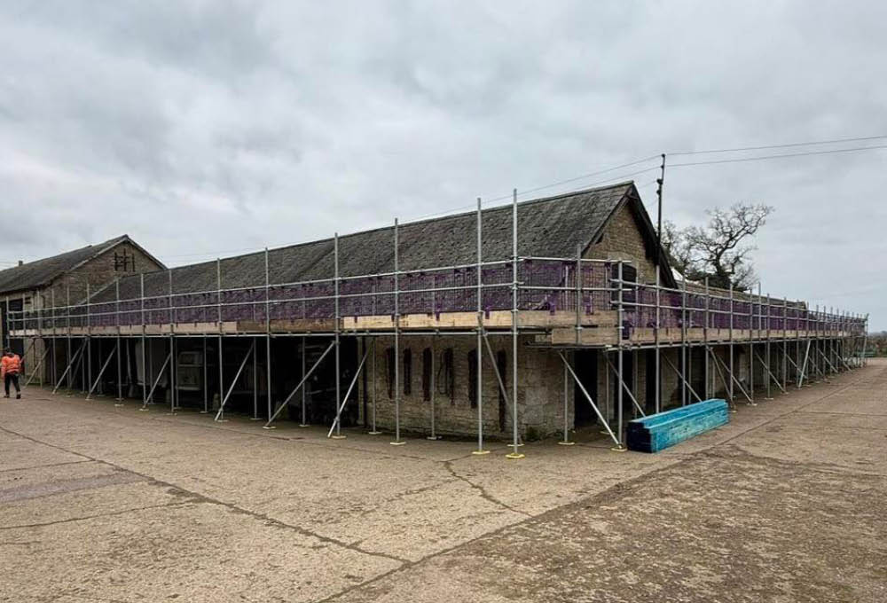 Blue slate roof changed to Crest Planum concrete tiles - during