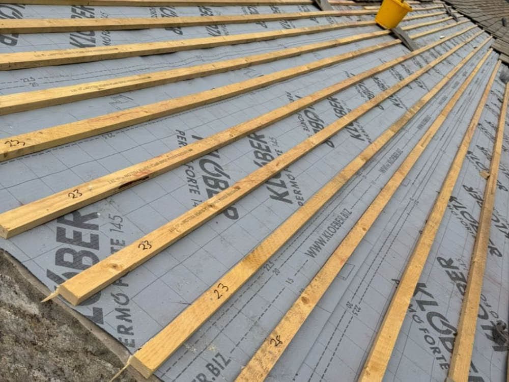 New roof insulation and roof batons in place - Bradstone Conservation Slate Project New roof insulation and roof batons in place - Bradstone Conservation Slate Project