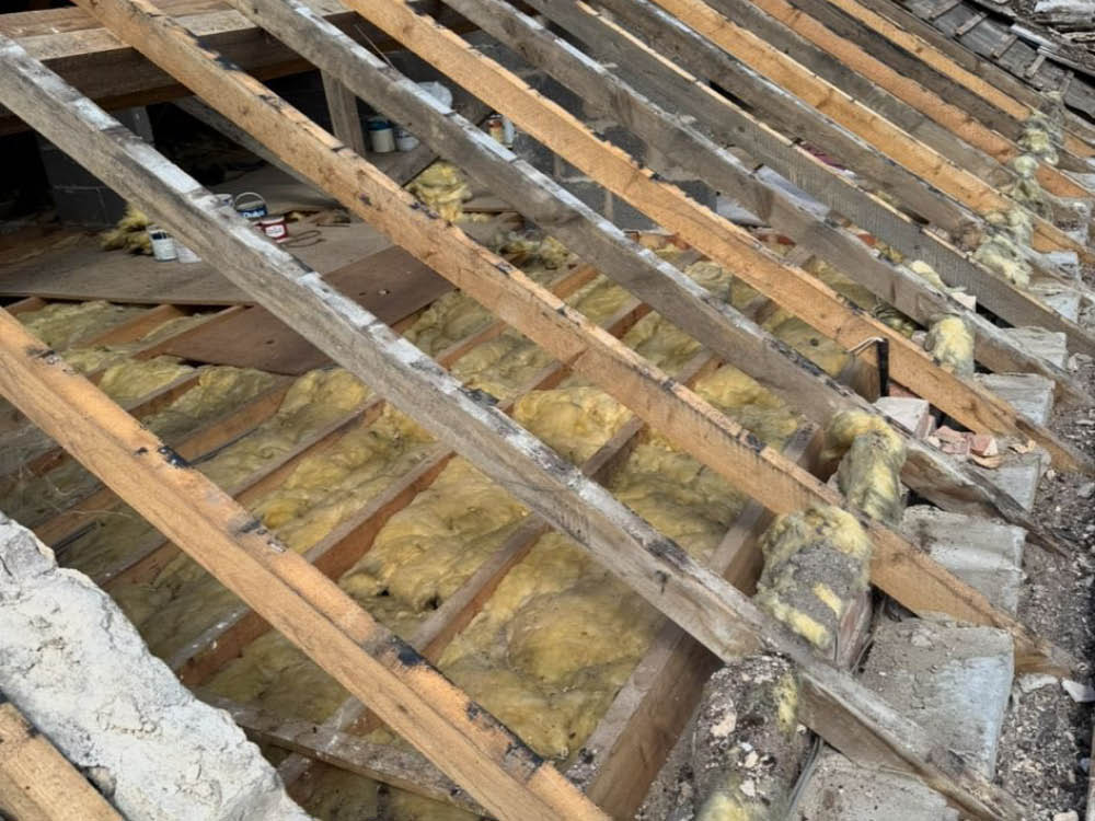 Roof stripped back - Bradstone Conservation Slate Project Roof stripped back - Bradstone Conservation Slate Project