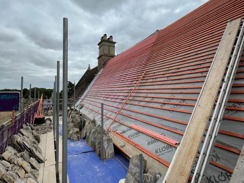 Collyweston re-slate Grade ll Listed Maor House in Northamptonshire - new batons installed