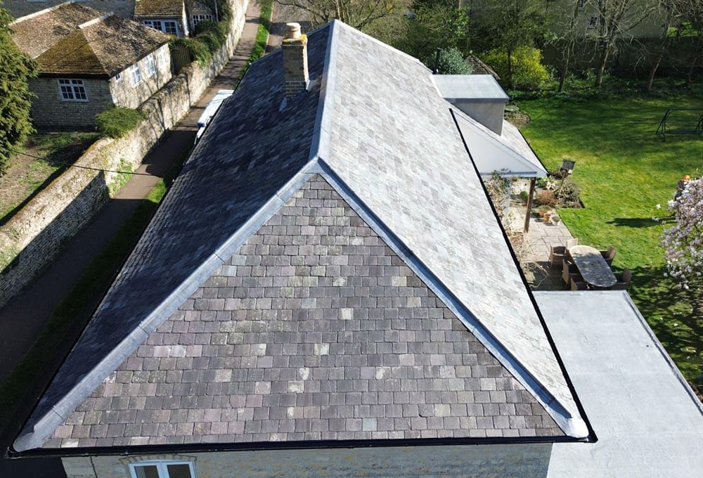 Roof completed with reclaimed Welsh blue slate - after
