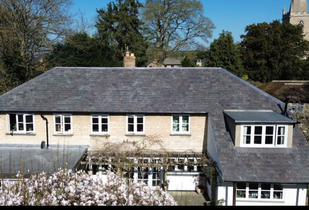 Roof completed with reclaimed Welsh blue slate - after