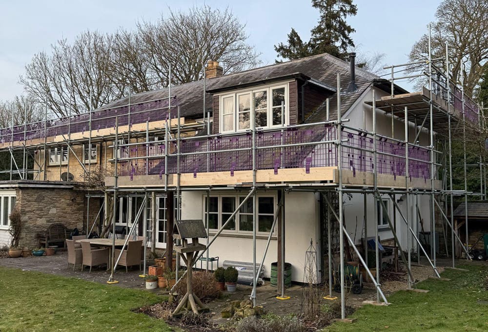 Roof completed with reclaimed Welsh blue slate - before