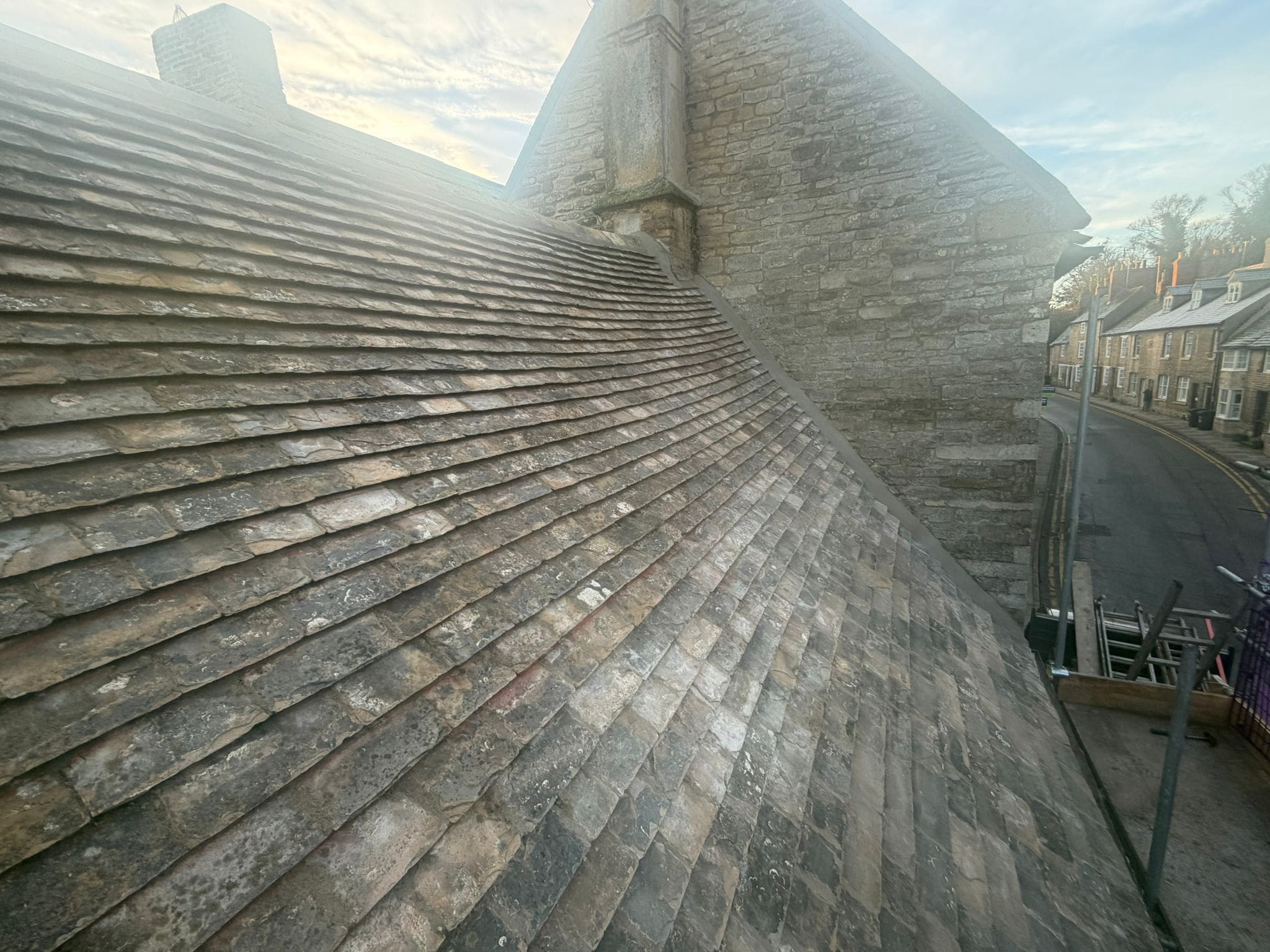 Collyweston Terraced Roof Reslate - after