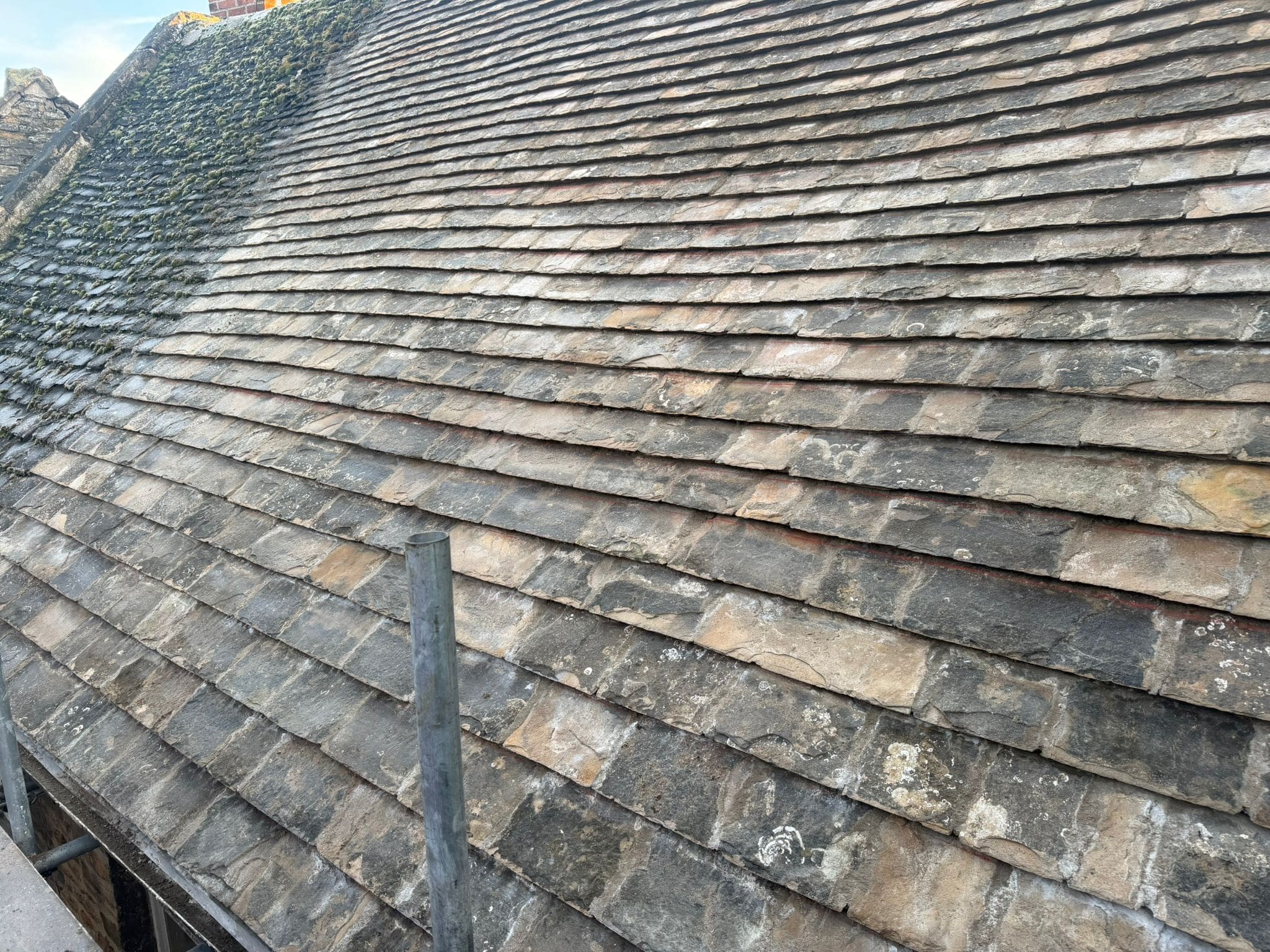 Collyweston Terraced Roof Reslate - after