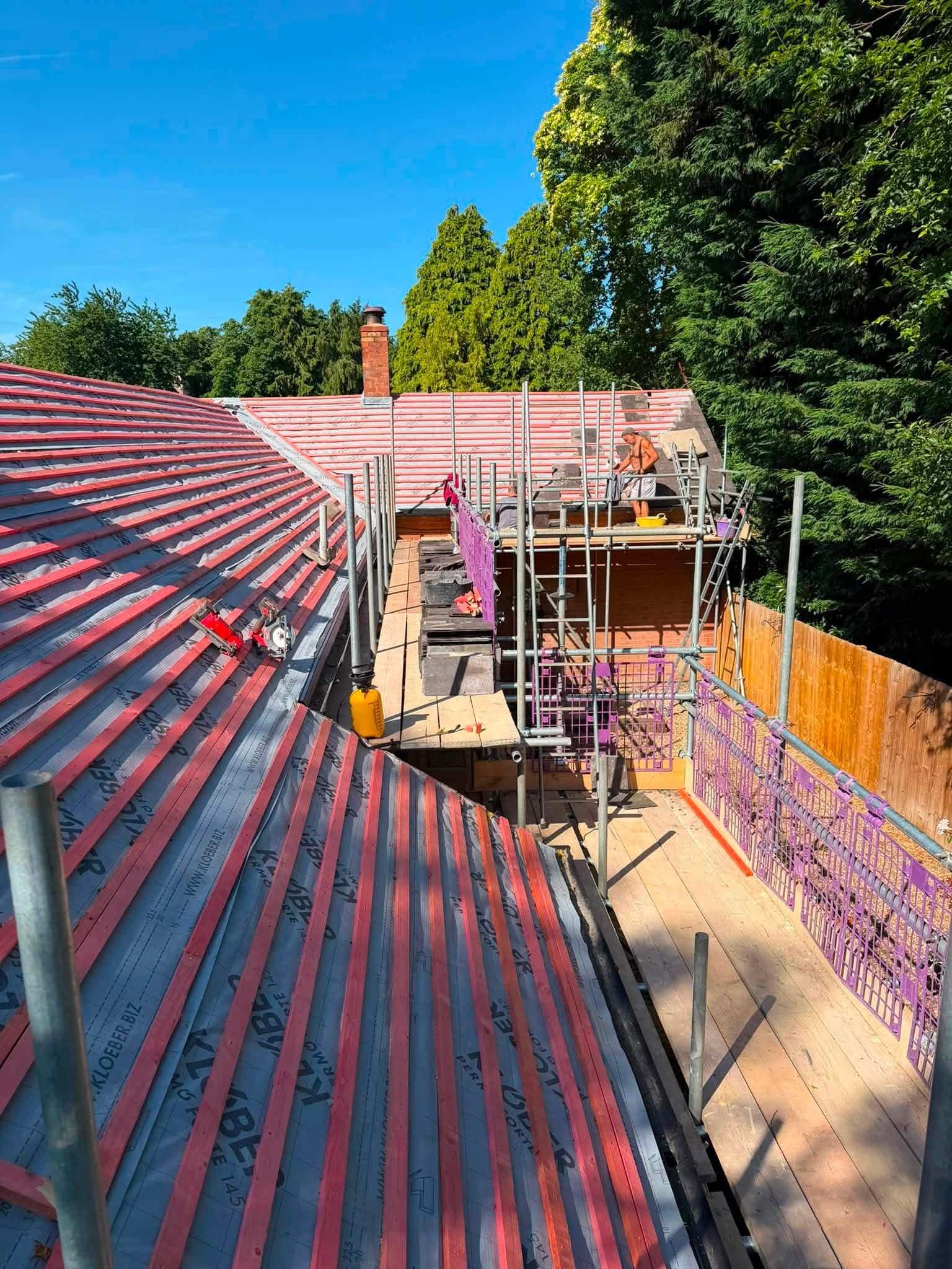 Tanalised timber battens up ready for the blue slate to be laid